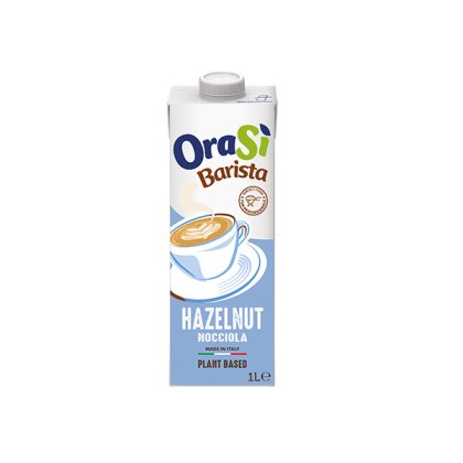 Kutija od 1 litre biljnog napitka OraSì Barista Hazelnut, svijetloplava etiketa s ilustracijom cappuccina.